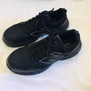 New Balance Black Athletic Shoes with White Accents
